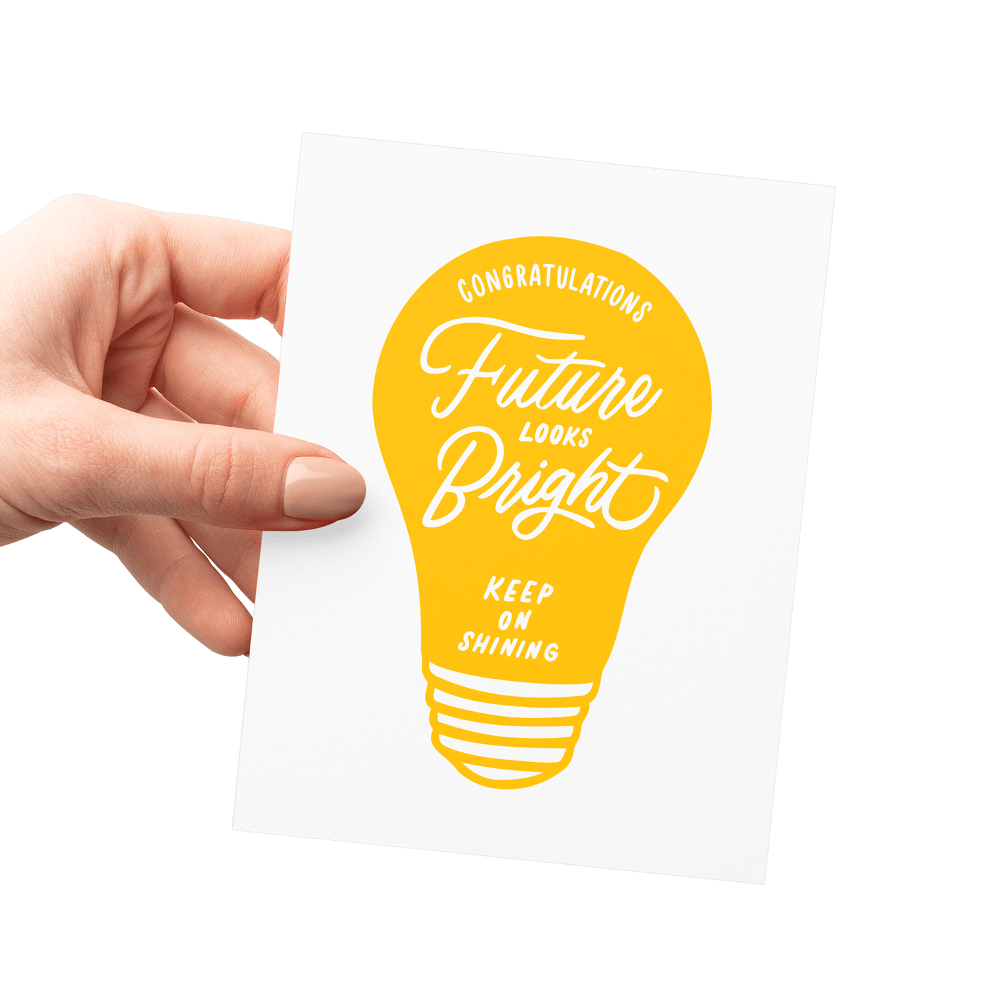 Hand holding a congratulations card featuring a yellow lightbulb illustration and hand-lettered typography, letterpress printed.