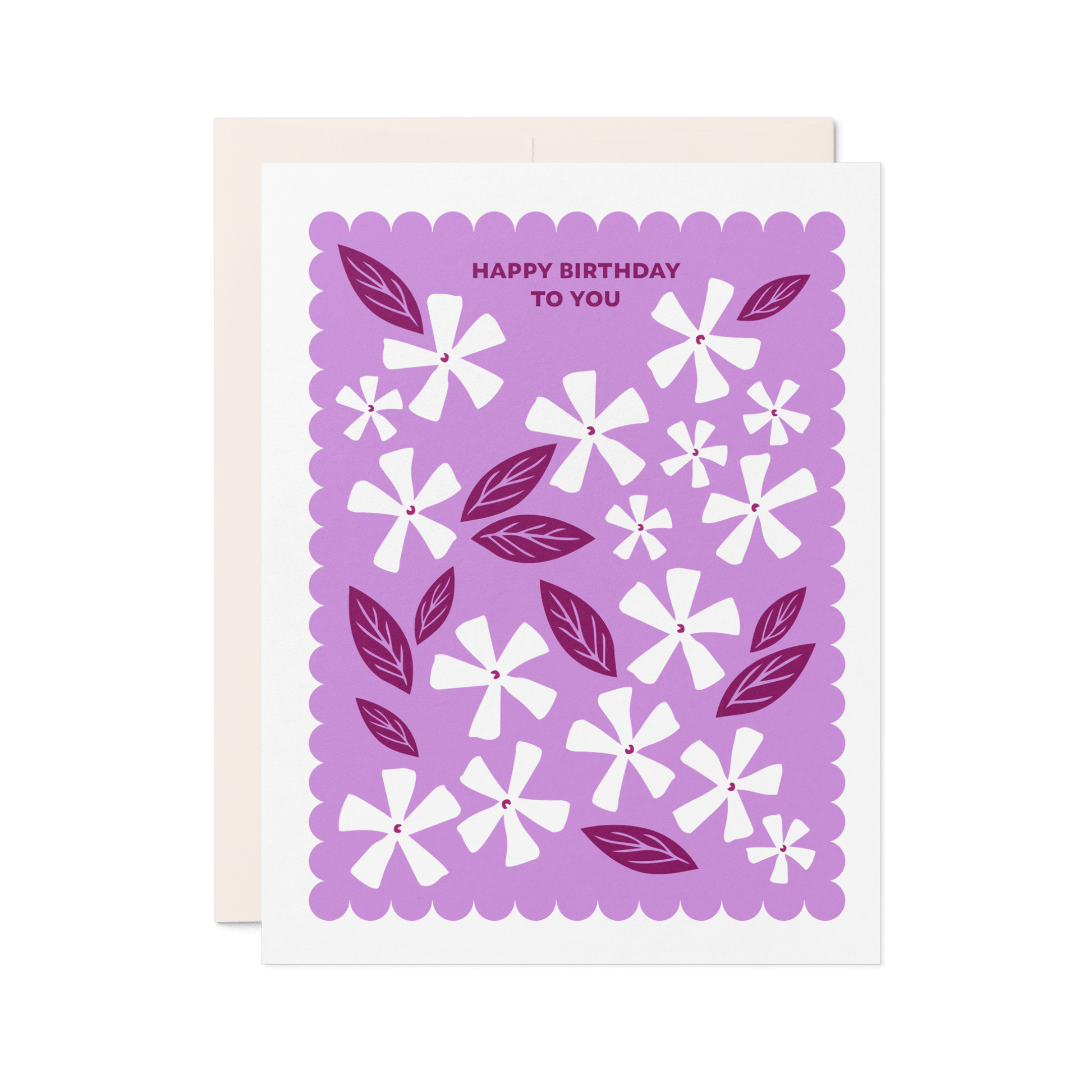 Letterpress birthday card with white floral illustrations, berry-toned leaves, and a purple scalloped border reading “Happy Birthday to You.