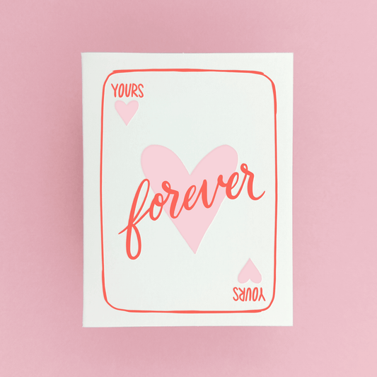 Love card that looks like a playing card with the words 'Yours Forever' in red script over a pink heart on white background.