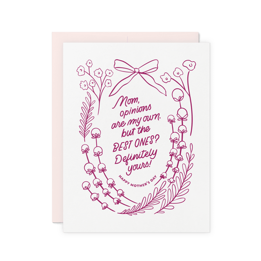 Floral Mother’s Day card with ‘Mom, opinions are my own, but the best ones? Definitely yours!’ in burgundy hand lettering, framed by vintage floral illustrations and a ribbon, printed on thick cotton paper.