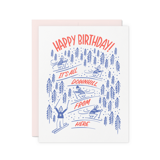 Ski-themed birthday card with 'It’s All Downhill From Here!' and vintage-style skiing illustrations, letterpress printed on thick cotton paper.