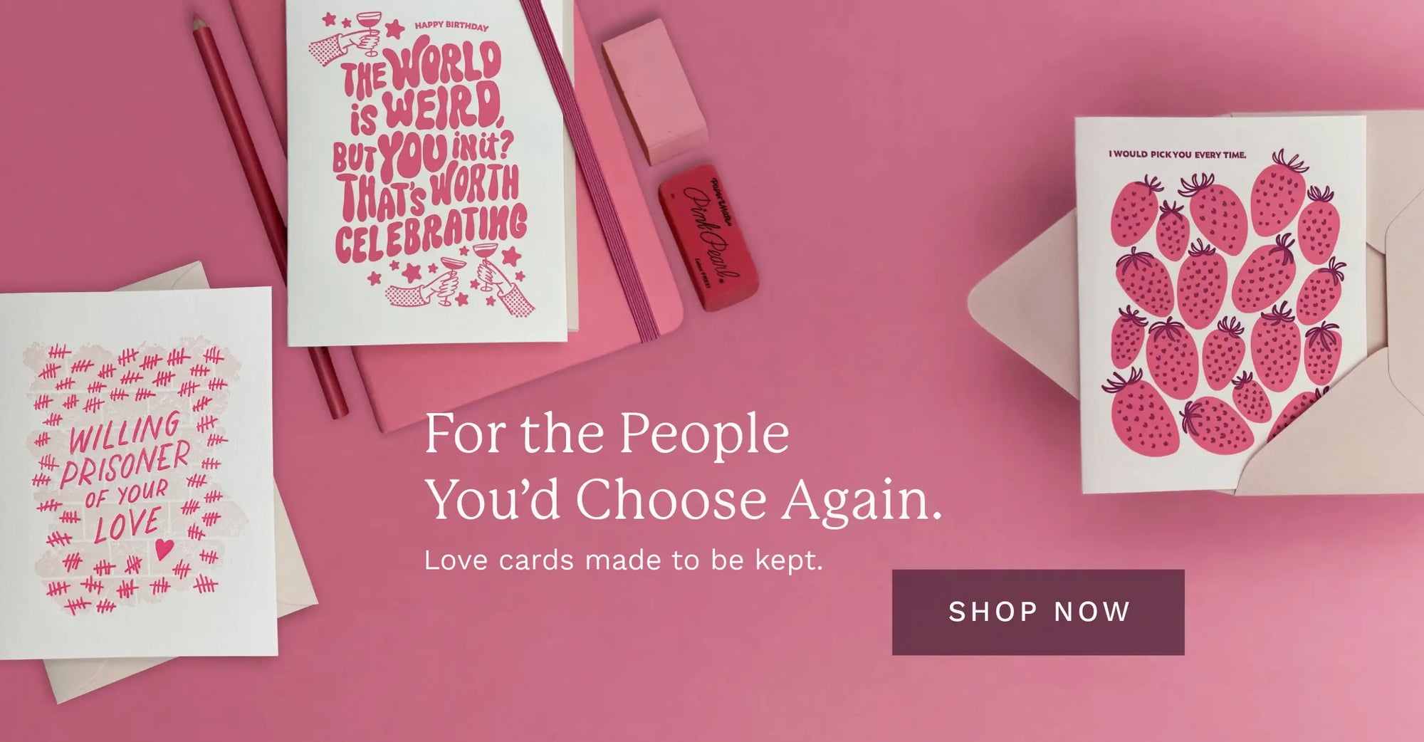 Letterpress love and friendship cards on pink background featuring hand lettering and illustrated strawberries