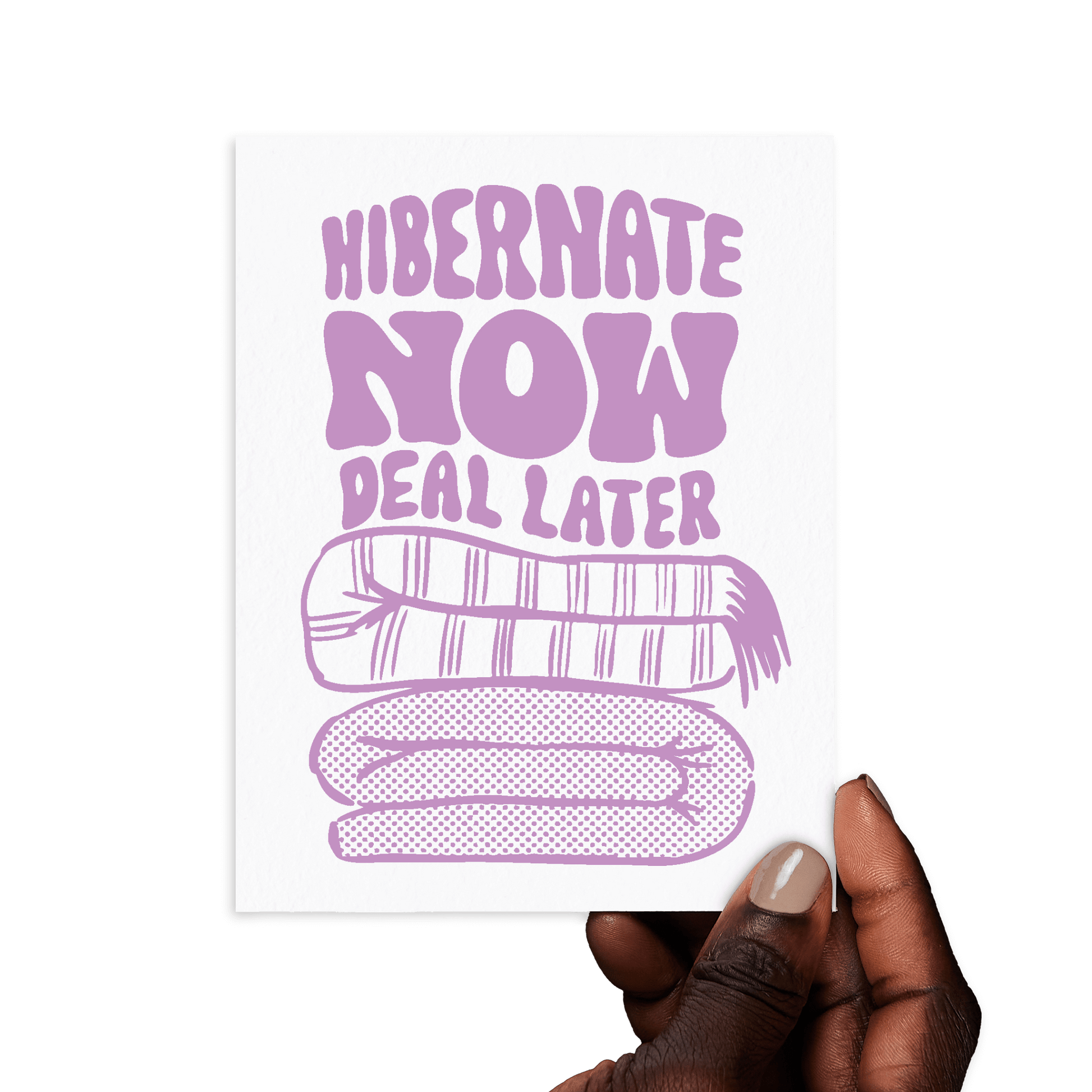Hand holding card with 'Hibernate now, deal later' in lavender hand lettering with cozy blanket illustration.