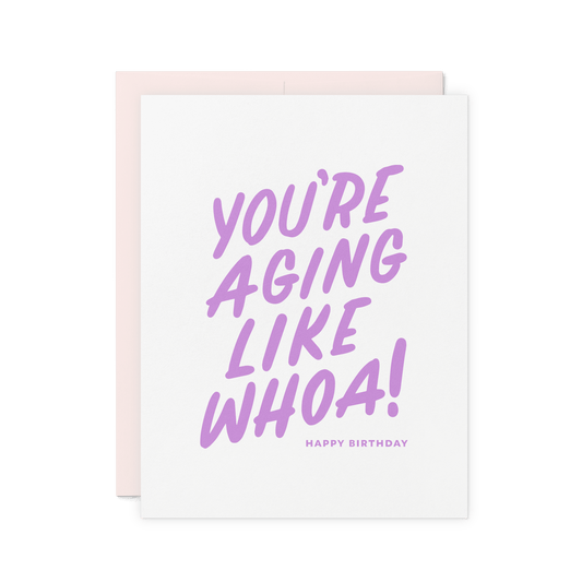 Funny birthday card with 'You're Aging Like Whoa!' in bold purple typography, letterpress printed on cotton paper.