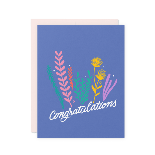 Congratulations card featuring a colorful wildflower bouquet illustration on a deep blue background, digitally offset printed on thick cotton paper.